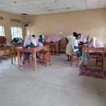 Students participating in a hands-on practical skills training session at Muhokya Parents Secondary School in Kasese.